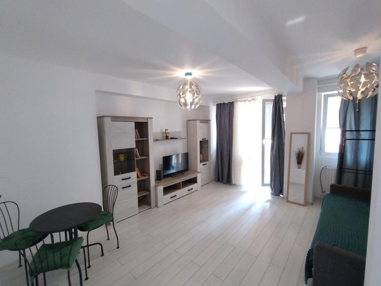 Apartament cu 2 camere decomandat în Roșu
