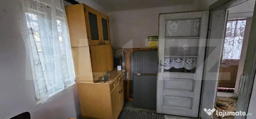 Casă cu 2 camere cu Teren 1200 Mp în Central