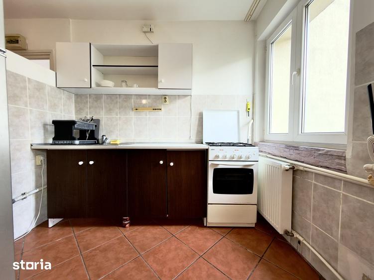 Apartament cu 3 camere în Romană