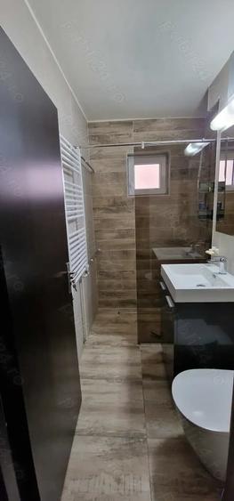 Apartament cu 3 camere semidecomandat în 1 Mai