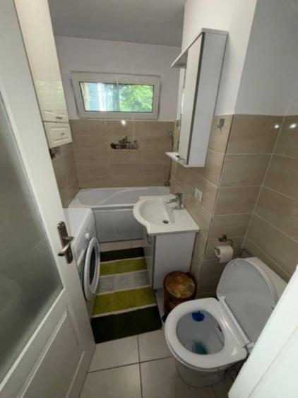 Apartament cu 2 camere semidecomandat în Podu Roș
