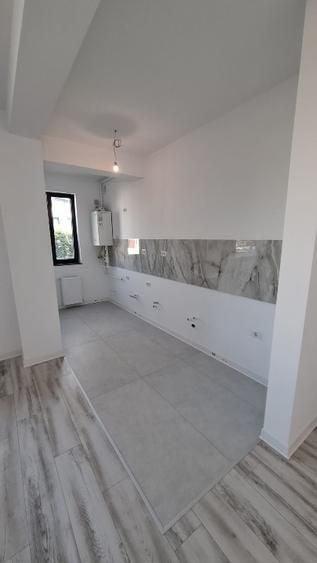 Apartament cu 3 camere decomandat în Kamsas