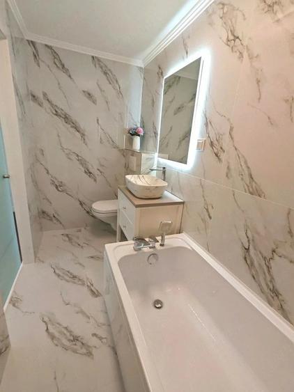 Apartament cu 4 camere decomandat în Calea Moldovei