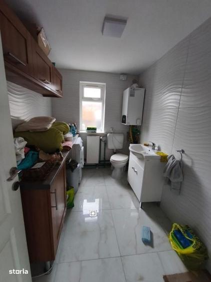 Casă cu 4 camere cu Teren 500 Mp în Central