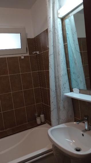 Apartament cu 2 camere semidecomandat, mobilat în Central
