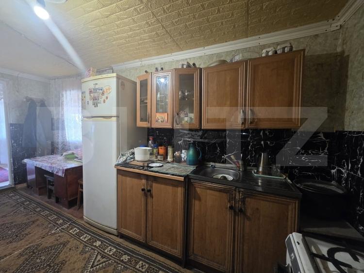Casă individuală cu 2 camere cu Teren 1336 Mp în Sătmărel