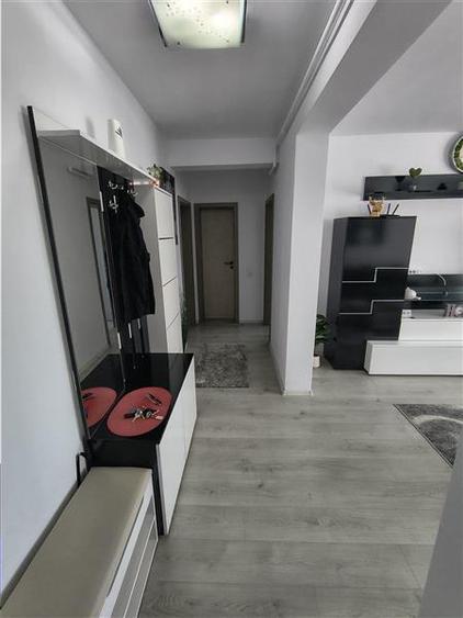 Apartament cu 2 camere decomandate balcon si loc de parcare etajul 1 - 14