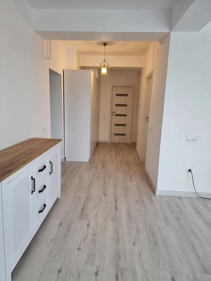 Ofer spre inchiriere apartament doua camere, bloc nou, cartier rezidential. Loc de parcare privat - 6