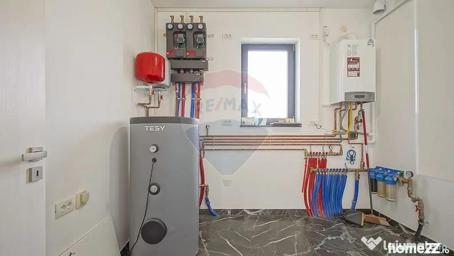 Casă cu 5 camere cu Teren 657 Mp în Hălchiu