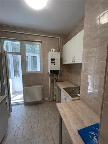 Apartament cu 3 camere decomandat în Magheru