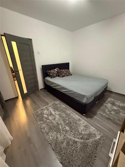 Apartament cu 2 camere semidecomandat, mobilat în Podu Roș