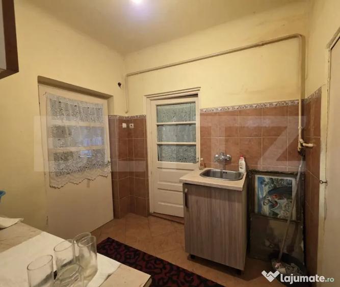 Casă cu 4 camere cu Teren 500 Mp în Titulescu