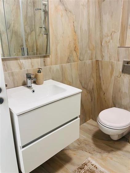 Apartament cu 2 camere semidecomandat, mobilat în Calea București