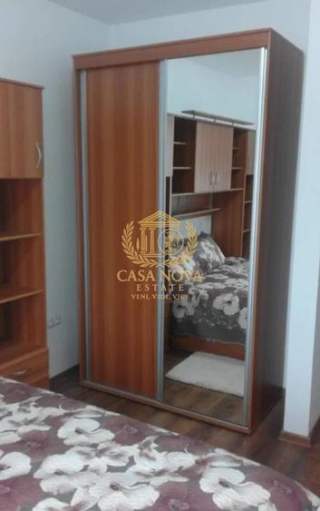 Apartament cu 3 camere semidecomandat, mobilat în Central