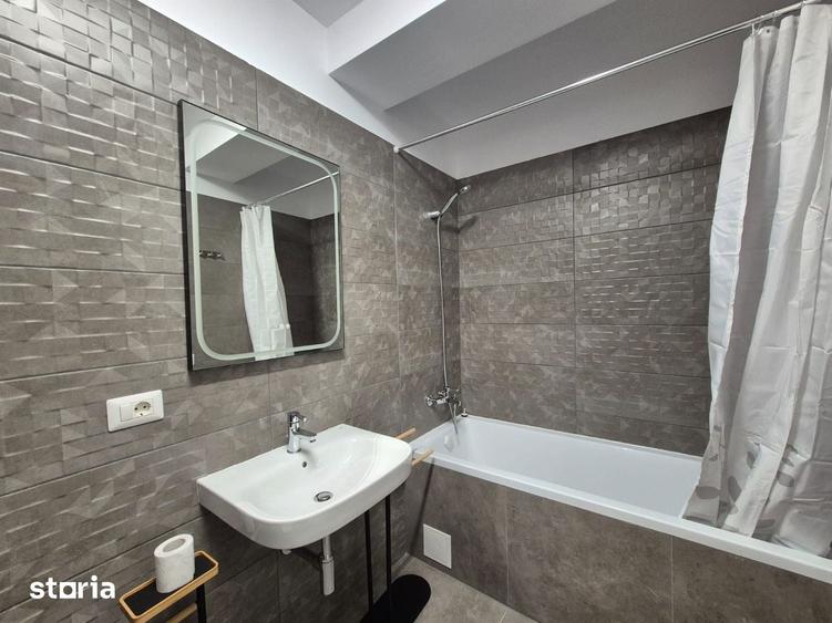 Apartament spatios, intr-o zona de case, loc parcare, bloc nou - 13