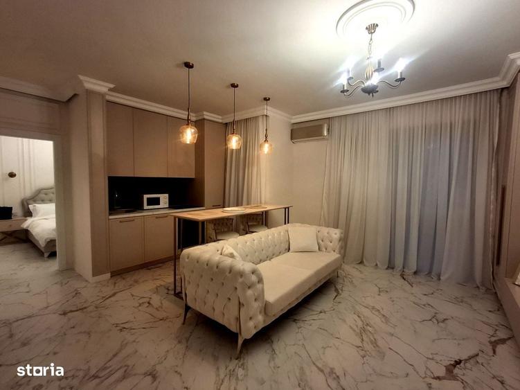 Apartament cu 2 camere, mobilat în Central