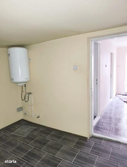 Casă cu 4 camere cu Teren 350 Mp în Central