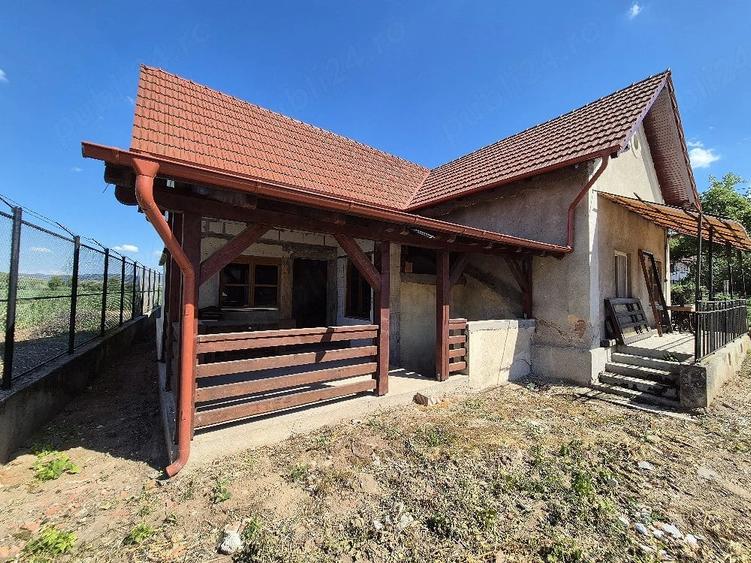 Casă cu Teren 1459 Mp în Central