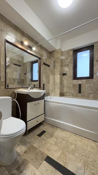 Apartament cu 2 camere semidecomandat, mobilat în Central