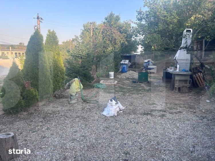 Casă cu 2 camere cu Teren 2000 Mp în Central