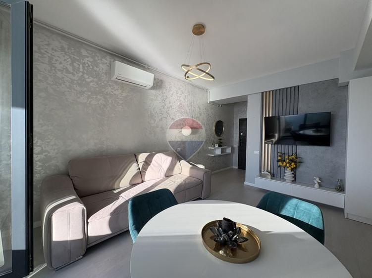 Apartament cu 2 camere semidecomandat, mobilat în Central