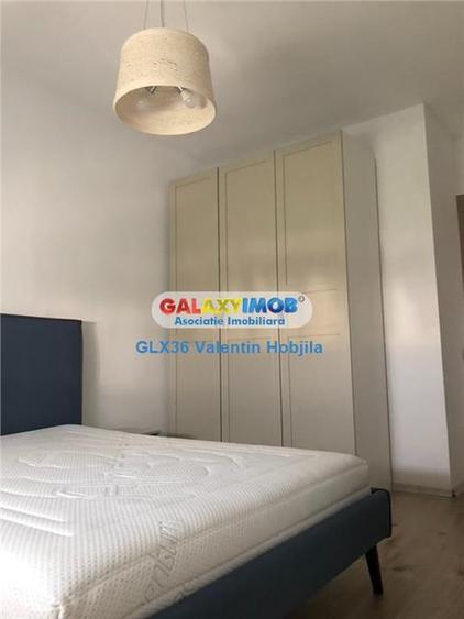 Apartament cu 3 camere semidecomandat, mobilat în Băneasa