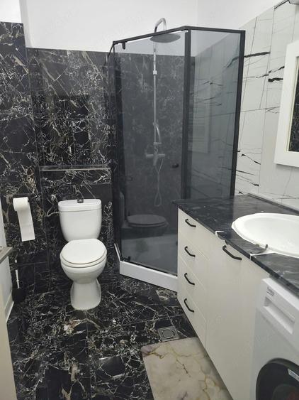 Apartament cu 2 camere semidecomandat, mobilat în UTA