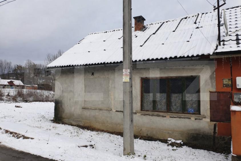 Casă cu 2 camere cu Teren 465 Mp în Central