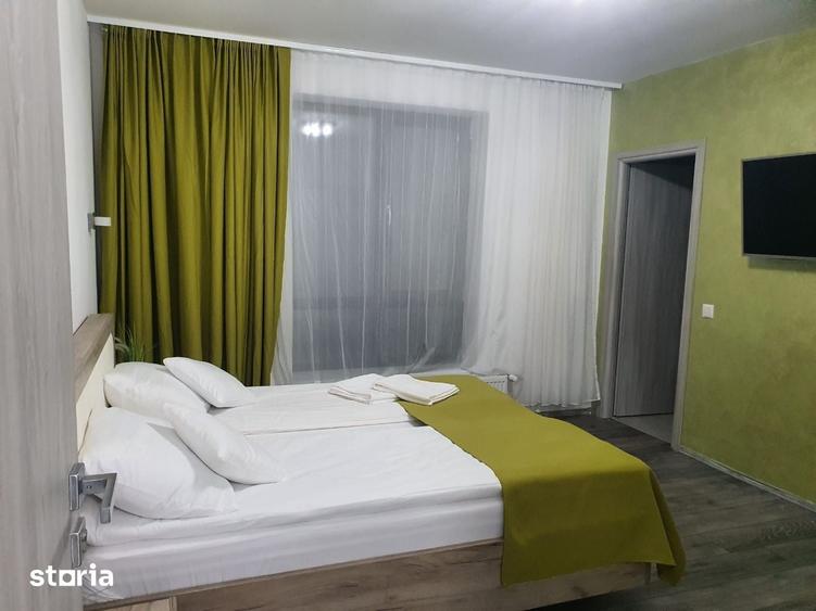 Casă cu 7 camere cu Teren 1500 Mp în Sânmartin