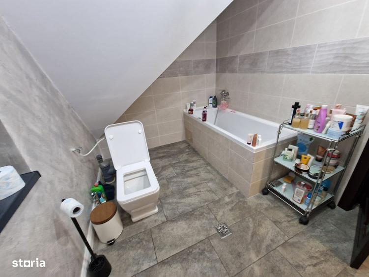Casă cu 4 camere cu Teren 450 Mp în Tunari