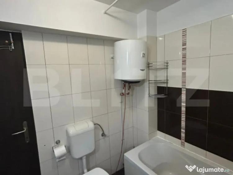 Garsonieră decomandată în Central
