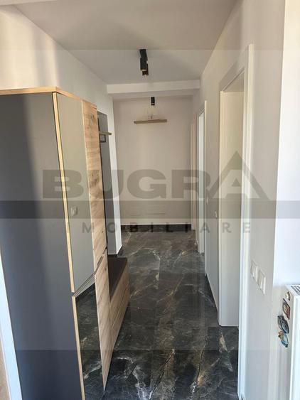 Apartament cu 3 camere semidecomandat, mobilat în Borhanci