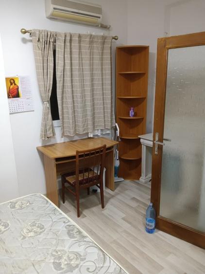 Garsonieră decomandată în Romană