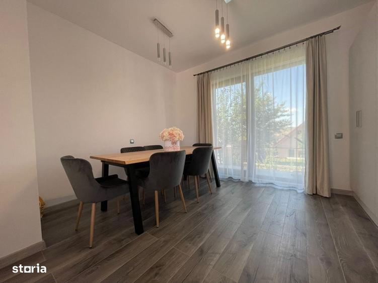 Casa individuala de vanzare cu 4 camere, amplasata pe un teren de 412 - 16