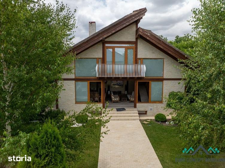 Casă cu 8 camere cu Teren 1000 Mp în Tulucești