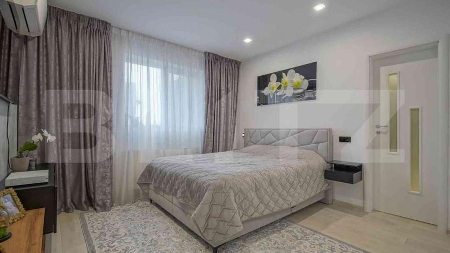 Apartament cu 4 camere decomandat în Tractorul