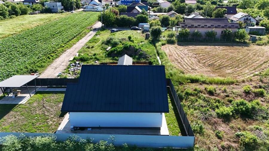 Casă cu 4 camere cu Teren 388 Mp în Holboca