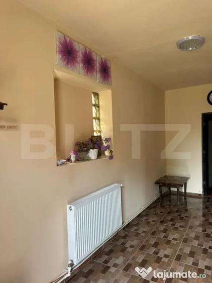 Casă cu 4 camere cu Teren 1480 Mp în Brădești