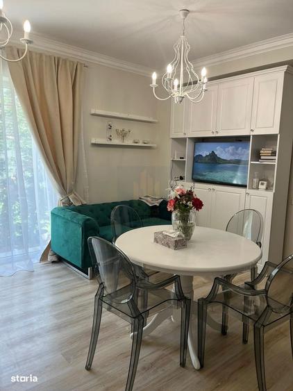Apartament cu 3 camere semidecomandat, mobilat în Central