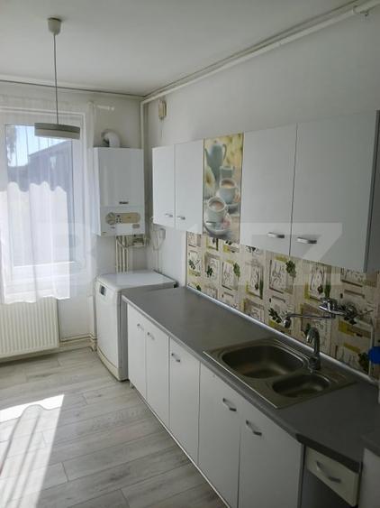 Apartament cu 2 camere semidecomandat, mobilat în Tractorul