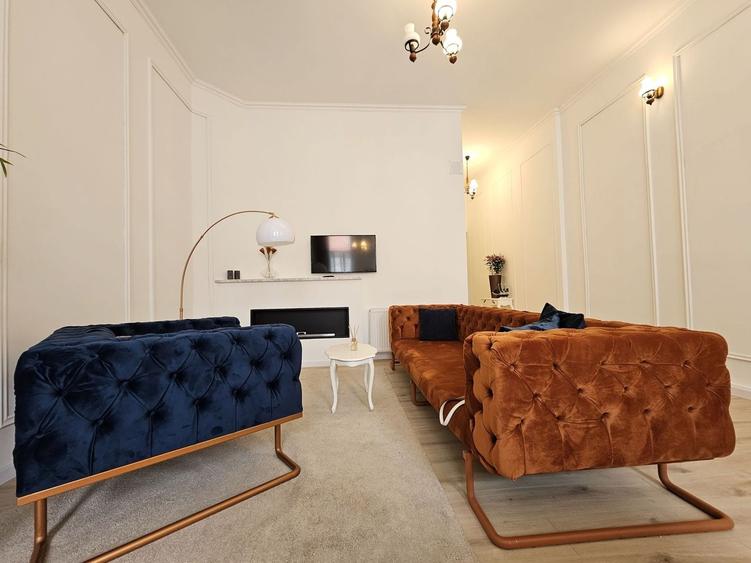 Apartament cu 3 camere semidecomandat, mobilat în Central