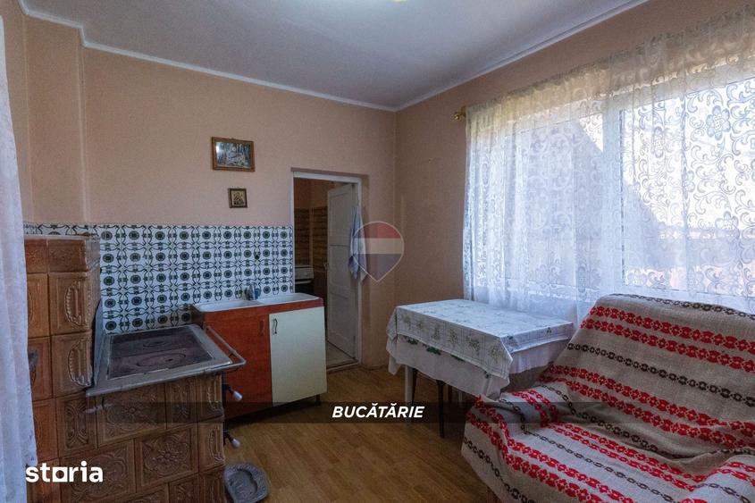 Casă cu 2 camere cu Teren 1300 Mp în Copalnic
