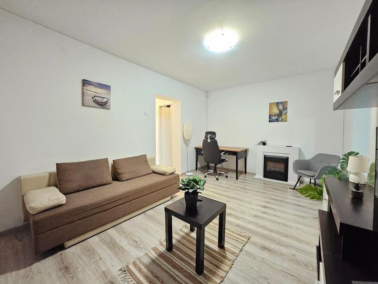 Apartament cu 2 camere semidecomandat, mobilat în Central
