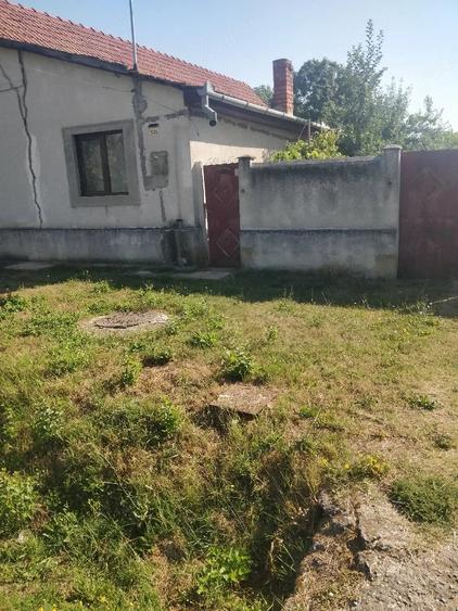 Casă cu Teren 1437 Mp în Central