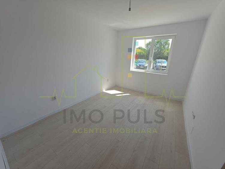 Apartament la parter cu balcon. Bucatarie separata. Loc de parcare - 1
