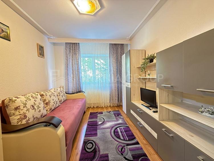 Apartament cu 2 camere, 2 bai, decomandat, etaj 1 - zona Racadau - 5
