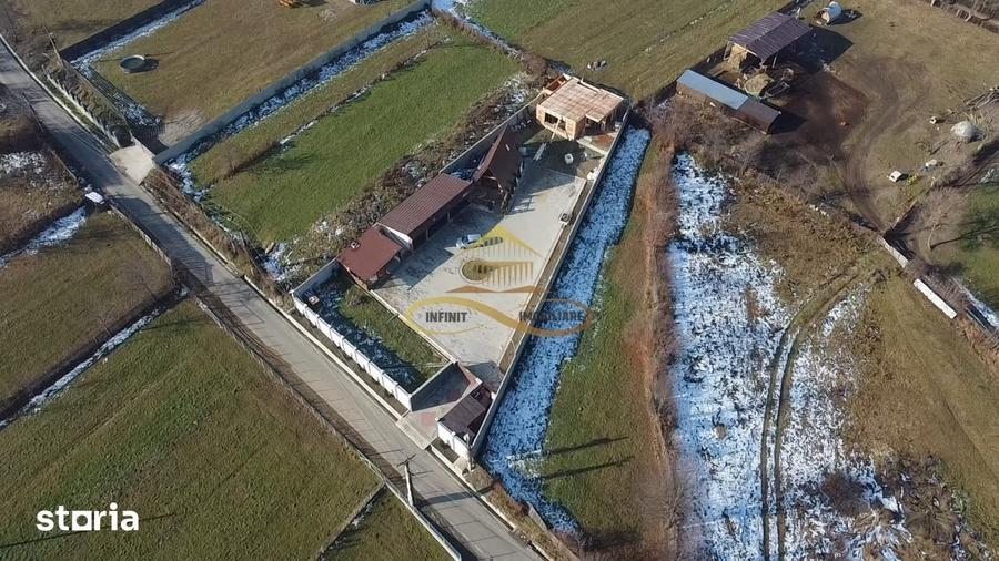 Casă cu 2 camere cu Teren 2500 Mp în Dofteana
