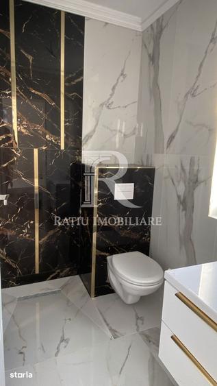 Casă cu 4 camere cu Teren 928 Mp în Sânmartin