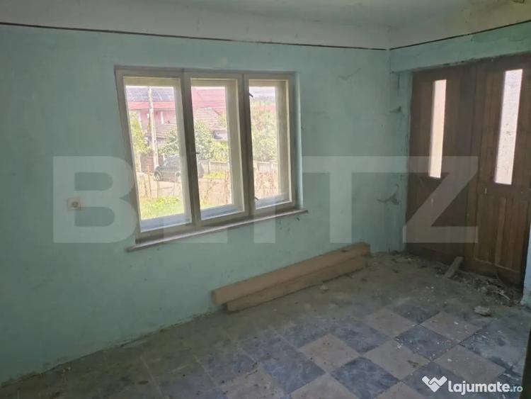 Casă cu 2 camere cu Teren 1200 Mp în Nord