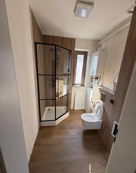 Apartament cu 3 camere semidecomandat, mobilat în Borhanci